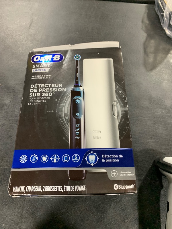 Photo 1 of Oral-B Pro Smart Limited Power Rechargeable Electric Toothbrush with (2) Brush Heads and Travel Case, Black