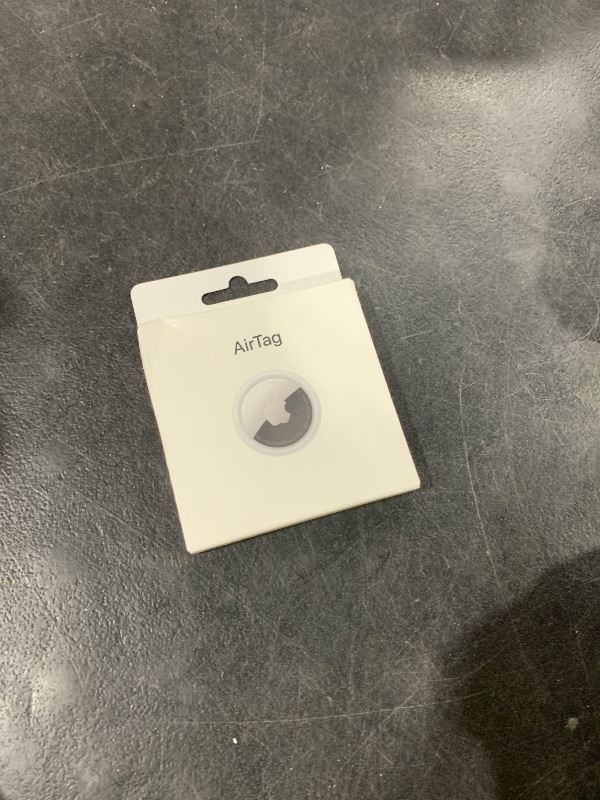 Photo 1 of Apple AirTag. Keep Track of and find Your Keys, Wallet, Luggage, Backpack, and More. Simple one-tap Set up with iPhone or iPad