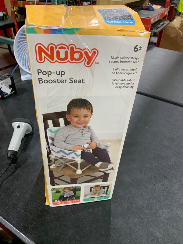 Photo 1 of Nuby Pop-Up Booster Seat with Removable Tray - 6+ Months - Portable Booster Seat for Floor Indoor/Outdoor Use - 3-Point Safety Adjustable Straps - Summer Travel Essentials - Black and White