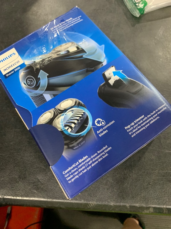 Photo 1 of Philips Norelco Shaver 3900 Series, Wet and Dry Electric Shaver, P-Cap, Travel Pouch, Charging Stand, Storm Blue, Model S3341/92