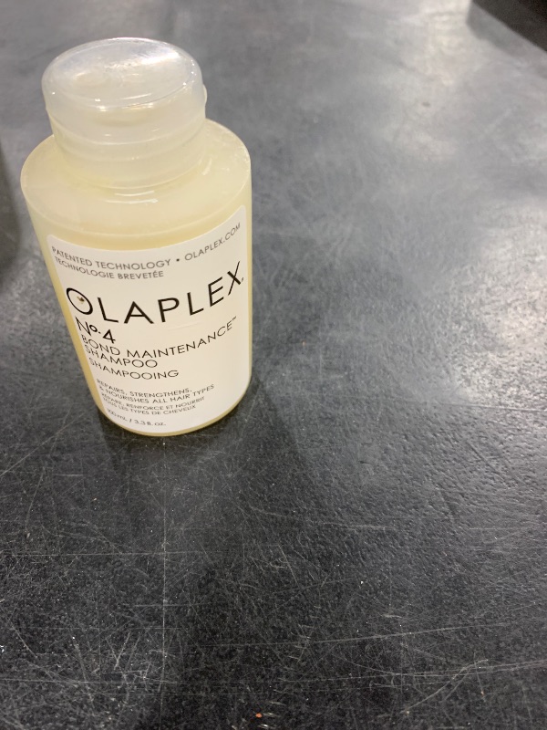 Photo 1 of Olaplex No. 4 Bond Maintenance Shampoo, Repairs, Strengthens, & Nourishes All Hair Types, Adds Shine & Leaves Hair Feeling Soft, 8.5 fl oz
