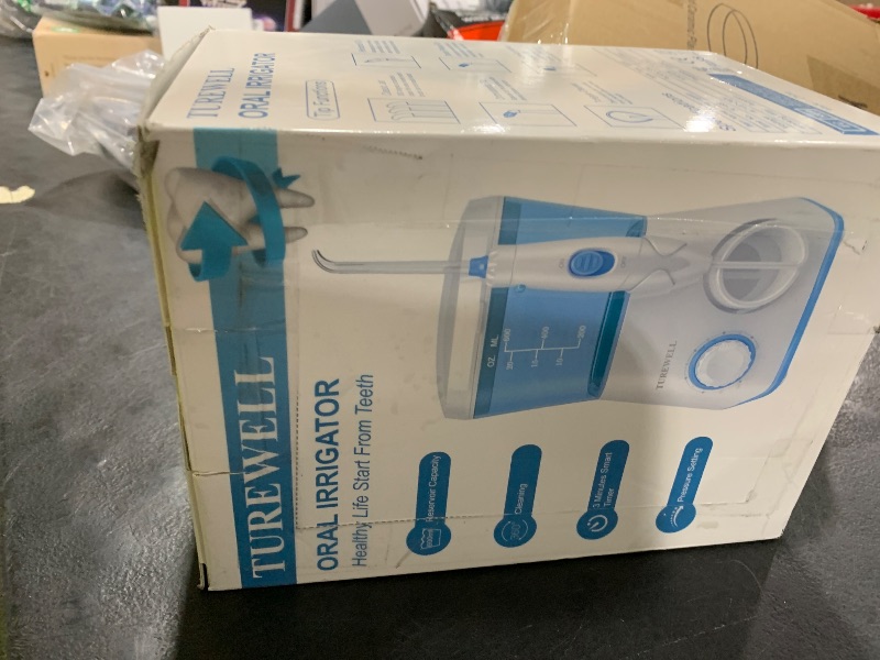 Photo 1 of TUREWELL Water Flossing Oral Irrigator, 600ML Dental Cleaner 10 Adjustable Pressure, Electric Oral Flosser for Teeth/Braces, 8 Replacement Jet Tips for Family (White)