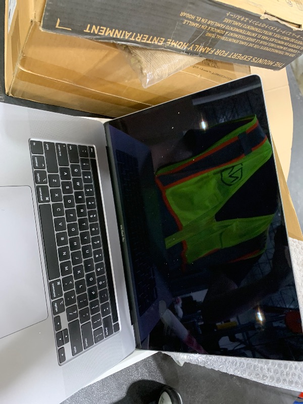 Photo 1 of Apple Late 2019 MacBook Pro with 2.6GHz Intel Core i7, 16-inch, 32GB RAM, 1TB Storage, Space Gray (Renewed)