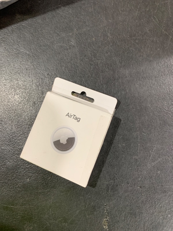 Photo 1 of Apple AirTag. Keep Track of and find Your Keys, Wallet, Luggage, Backpack, and More. Simple one-tap Set up with iPhone or iPad