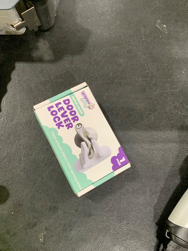 Photo 1 of Door Lever Lock (1 Pack) Prevents Toddlers from Opening Doors. 3.25" L * 1.5" W * 4.5" H Easy One Hand Operation for Adults. Durable ABS with 3M Adhesive Backing. Simple Install, No Tools Needed.