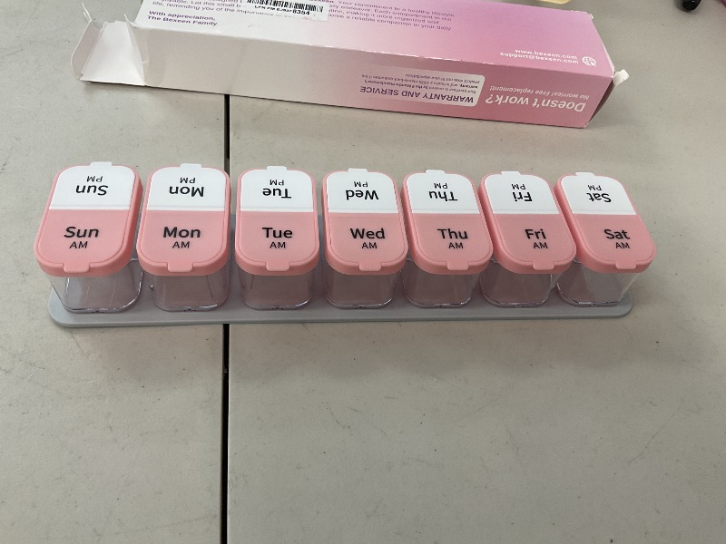 Photo 1 of Extra Large Weekly Pill Organizer - XL Vitamin Holder with 7 Detachable AM PM Compartments - Portable Medicine Dispenser for Home and Travel, Big Supplement Container for Weekly or Daily Use, Pink