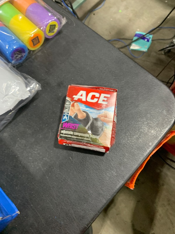 Photo 1 of ACE Brand Adjustable Compression Wrist Support, Moderate Support for Weak, Sore or Injured Joints, Wrist Support Conforms to Wrist, One Size Fits Most