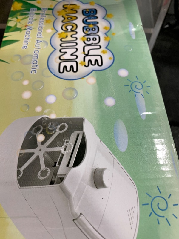 Photo 1 of Bubble Machine, Automatic 18000+ Per Minute Big Bubbles Blower Maker for Kids Toddlers with 2 Speeds,6 Wands,Operated by Plugin or Batteries for Outdoor/Indoor Birthday Parties,Wedding (White)
