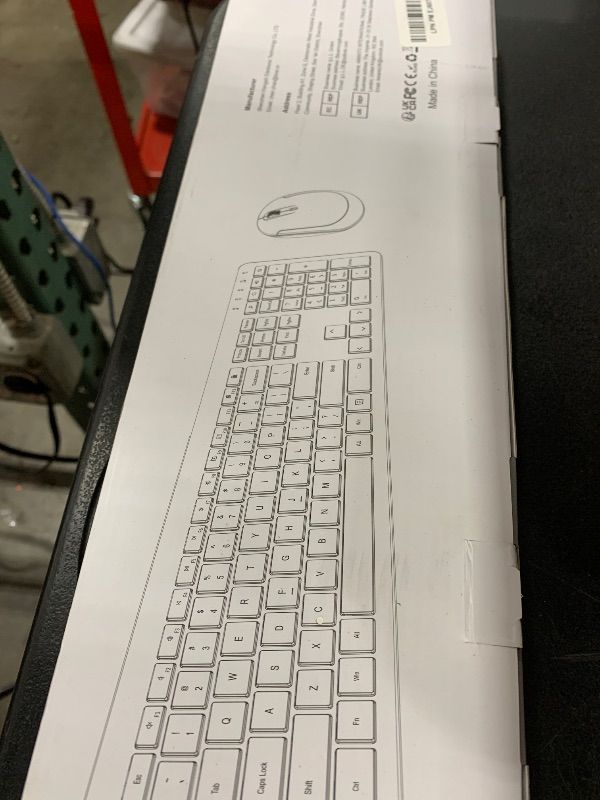 Photo 1 of Wireless Keyboard and Mouse Combo - Full Size Slim Thin Wireless Keyboard Mouse with Numeric Keypad 2.4G Stable Connection Adjustable DPI (White & Silver)