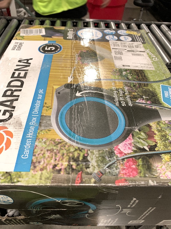 Photo 1 of GARDENA (18604-80) 50' x 1/2" Automatic Retractable Garden Hose Reel for Outside Use on Metal Spike With Easy Swivel for Simple Watering of Gardens and Grass. 5 year Warranty