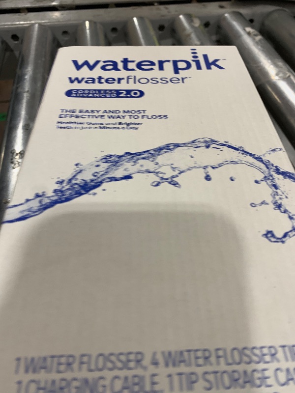 Photo 1 of Waterpik Cordless Advanced 2.0 Water Flosser For Teeth, Gums, Braces, Dental Care With Travel Bag and 4 Tips, ADA Accepted, Rechargeable, Portable, and Waterproof, White WP-580, Packaging May Vary