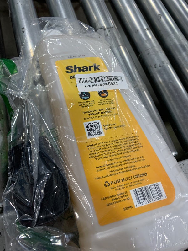 Photo 1 of Shark CarpetXpert Deep Clean Pro Formula for All Shark Upright & Portable Carpet Cleaners, Formulated for all Carpets, Upholstery & Area Rugs, Eliminates Tough Pet Messes and Odors, 48oz, EXCM48