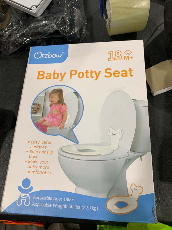 Photo 1 of Orzbow Foldable Toddler Potty Training Seat with Suction Cups Firmly Adhere, Travel Potty Seat with Adjustable Length, Fits Most Adults Toilets, Includes Splash Guard, Easy to Clean, Ivory White