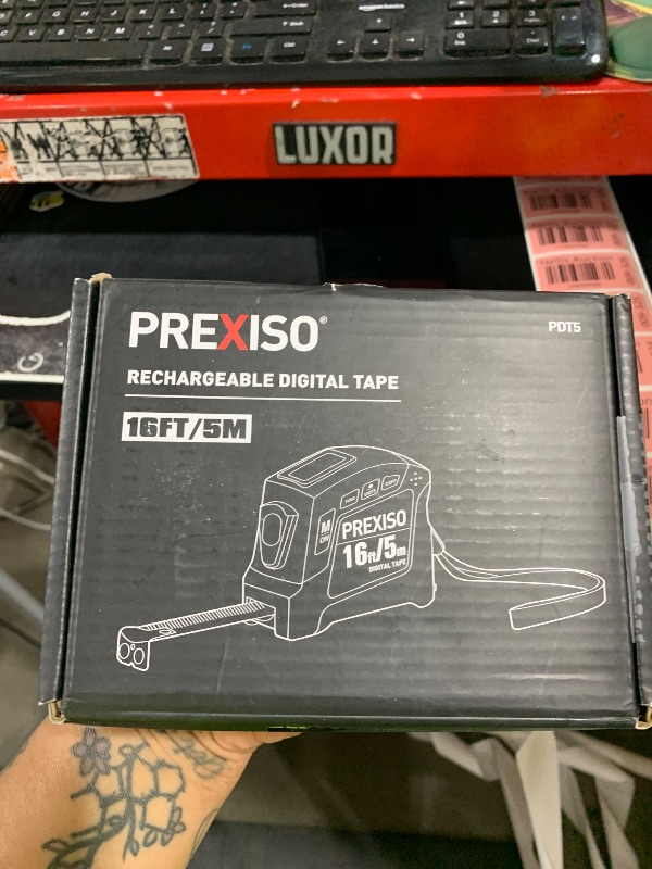 Photo 1 of PREXISO 2-in-1 Digital Tape Measure - 16Ft Rechargeable Measuring Tape Ruler Ft/Ft+in/in/M/CM/MM Unit - Metric & Inches Retractable Measurement Tape Tool with Magnetic Tip - Pythagorean, Area, Volume