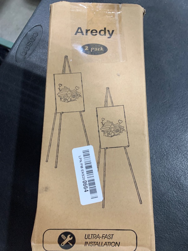 Photo 1 of Easel Stand for Sign, Aredy 63" Portable Painting Easel, Lightweight Metal Easels for Painting Canvas, Wedding Sign (2 Pack)