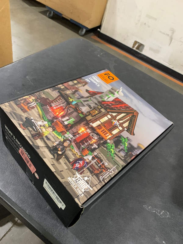 Photo 1 of FUNWHOLE Medieval Forge House Lighting Building Bricks Set - 1595 Pcs Blacksmith Kit Castle House Collectible Display Set for Adults and Teens