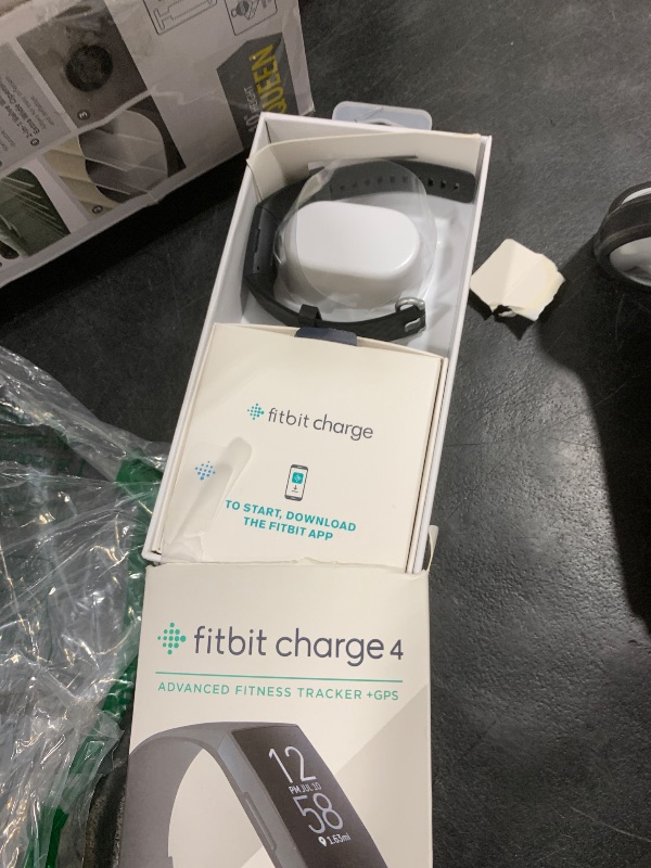 Photo 1 of Fitbit Charge 4 Black Advanced Fitness Tracker