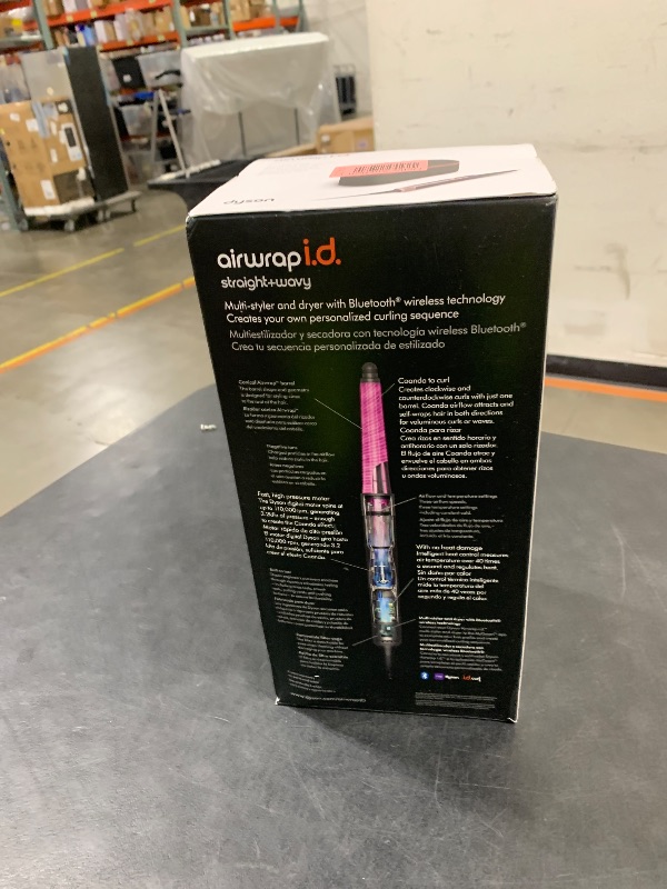 Photo 1 of Limited Edition Dyson Airwrap i.d.™ Multi-Styler and Dryer Straight+Wavy in Jasper Plum
