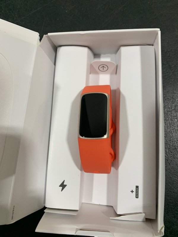 Photo 1 of Fitbit Charge 6 Fitness Tracker with Google apps, Heart Rate on Exercise Equipment, 6-Months Premium Membership Included, GPS, Health Tools and More, Gold/Coral, One Size (S & L Bands Included)