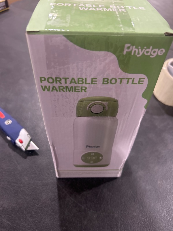 Photo 1 of Portable Bottle Warmer for Travel, 15oz Capacity Portable Milk Warmer for Baby, Formula, Breast Milk & Water, On The Go Bottle Warmer with Long Battery Life, Even Heating, Precise Temperature Control