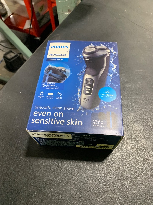 Photo 1 of Philips Norelco Shaver 3900 Series, Wet and Dry Electric Shaver, P-Cap, Travel Pouch, Charging Stand, Storm Blue, Model S3341/92