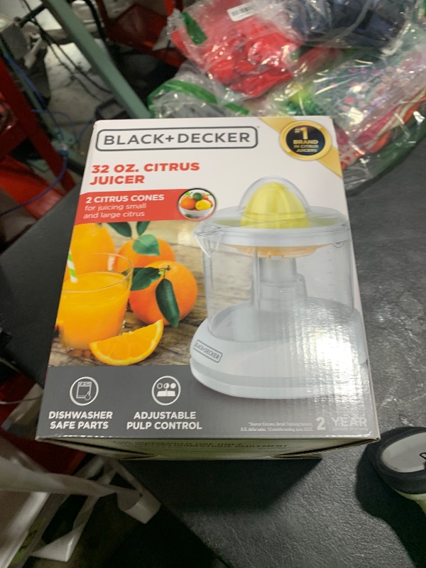 Photo 1 of BLACK+DECKER 32oz Citrus Juicer with Self-reversing Cone, White, CJ650W