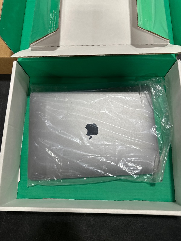 Photo 1 of Apple Late 2020 MacBook Air with Apple M1 Chip, 13.3-inch, 8GB RAM, 256GB SSD, Space Gray (Renewed Premium)