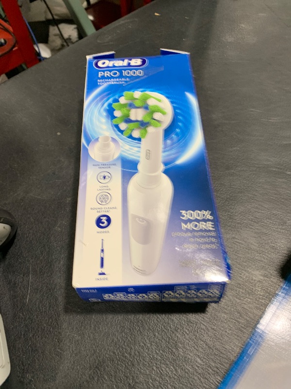 Photo 1 of Oral-B Pro 1000 Rechargeable Electric Toothbrush, White