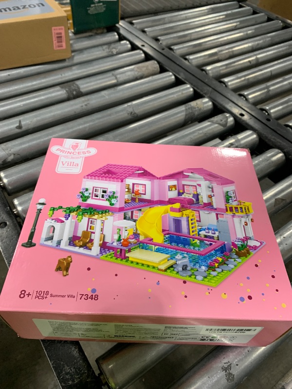Photo 1 of Pink Girls Summer Villa Friends Building Set Compatible with Lego Friends Construction Educational Toy for Kids Age 8-12 and Up 1018 PCS