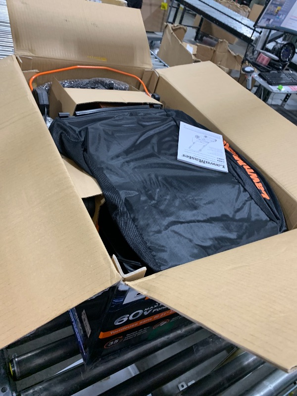 Photo 1 of Lawnmaster CLMFR6020A 60V MAX BRUSHLESS Li-On 21” Lawn Mower, Black & Orange
