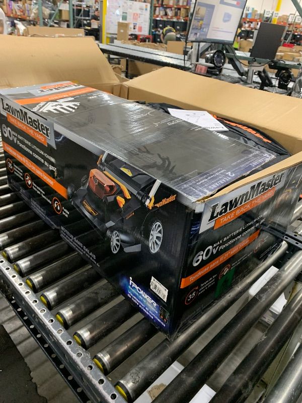 Photo 1 of Lawnmaster CLMFR6020A 60V MAX BRUSHLESS Li-On 21” Lawn Mower, Black & Orange
