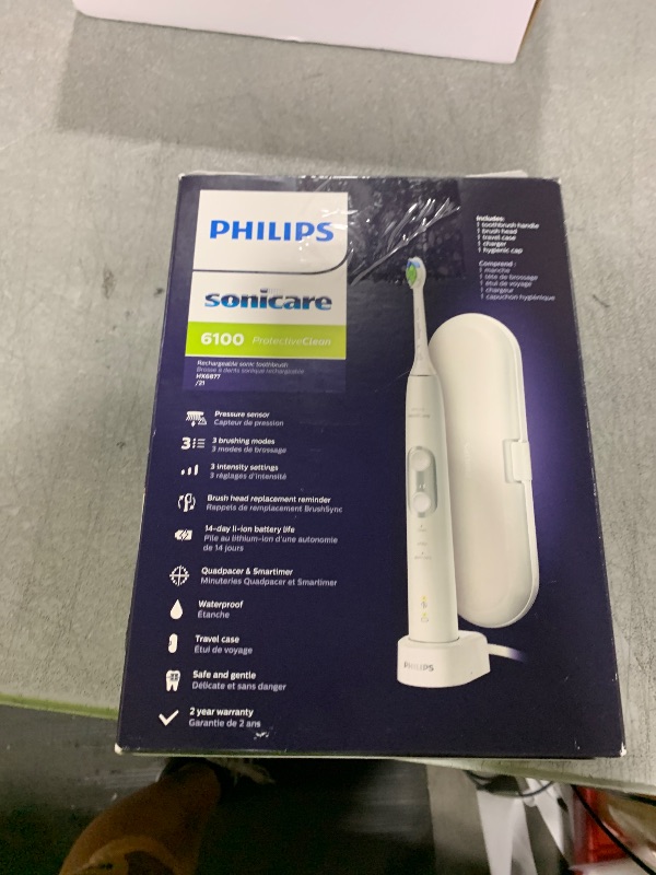 Photo 1 of PHILIPS Sonicare ProtectiveClean 6100 Rechargeable Electric Toothbrush, with Pressure Sensor, 3 Cleaning Modes, SmarTimer and QuadPacer, 14-Day Battery Life, Travel Case, White, Model HX6877/21