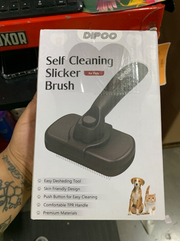 Photo 1 of Dipoo Self Cleaning Shedding Brush - Skin Friendly Grooming Tool for Dogs, Cats, and Puppies, Deshedding and Hair Removal for Long and Short Haired Pets, Black