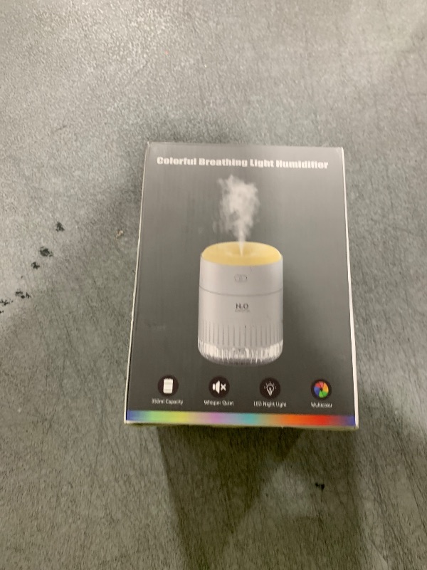 Photo 1 of Rechargeable Mini Humidifier with 7 Color Light, Small Personal Desktop Humidifier for Baby Bedroom, Office, Nursery, Travel with Auto Shut-Off, Super Quiet (Black)