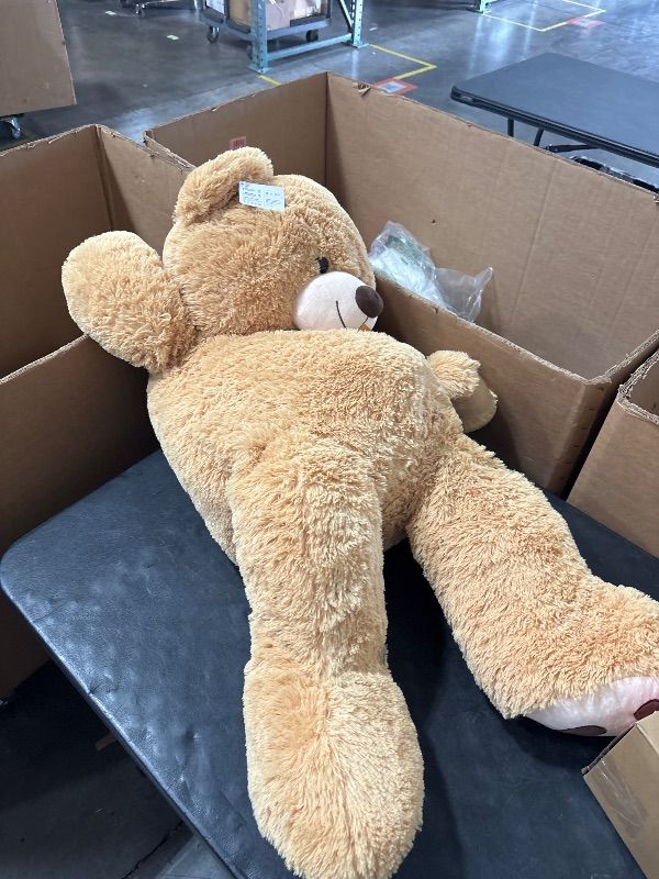 Photo 1 of MorisMos 47inch Giant Teddy Bear Stuffed Animal 4ft, Large Teddy Bear Plush, Big Stuffed Bear Gifts for Kids, Girls, Girlfriend, Women on Baby Shower, Valentine, Christmas, Birthday (Light Brown