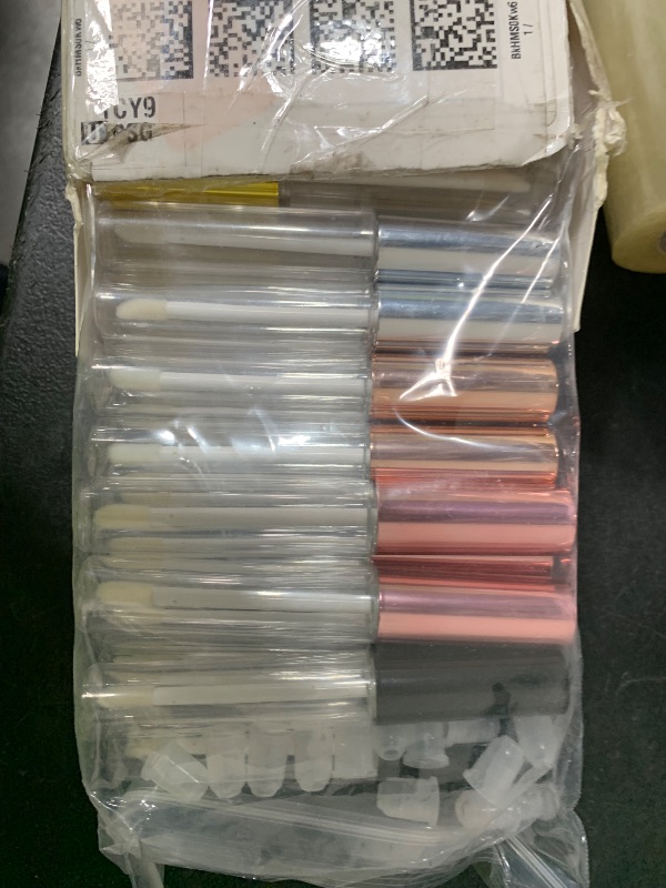 Photo 1 of KPX 30 Pcs lip Gloss Tube Containers Bulk Wand 10ml Empty Clear Pink Lip Oil Tubes Refillable Lip Balm Bottles with Rubber Insert for DIY Makeup Such as Lip Samples, Homemade Lip Balm(Black)
