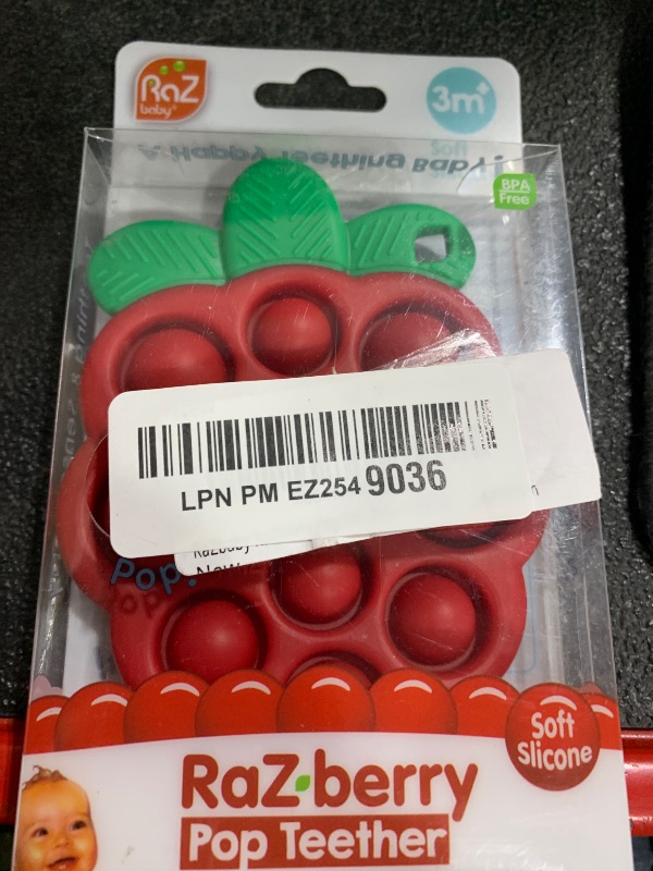 Photo 1 of RaZbaby RaZberry Pop Strawberry Teether – Multi-Textured Silicone for Sensory Development & Teething Relief – Easy to Hold for Small Hands – Soft BPA-Free Design for Babies 3 Months+, Red/Green