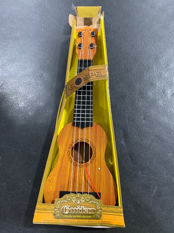 Photo 1 of Raimy 17in Kids Ukulele Guitar - 4 Strings Mini Guitar Children Musical Instruments Educational Toys with Picks for Toddler Kids Boys Girls Beginner (Burlywood)