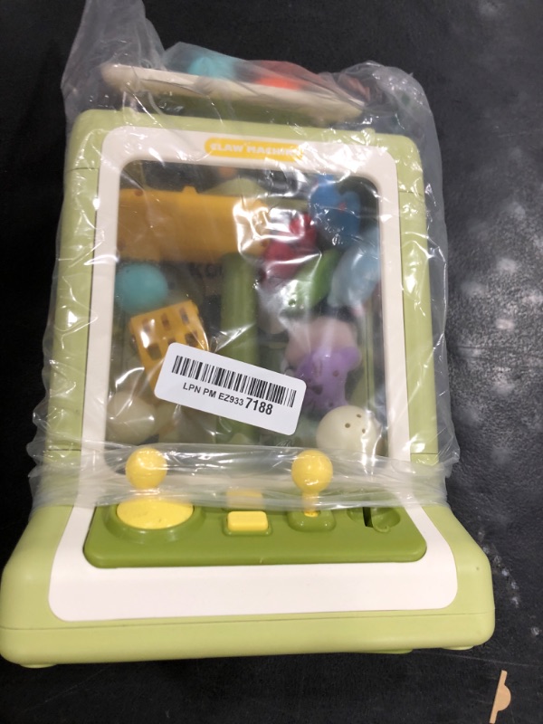 Photo 1 of Dinosaur Claw Machine for Kids Ages 3+, Mini Electronic Arcade Game Vending Toy Candy Dispenser Crane Prize Machine with Music for Boys Girls Christmas Birthday Party Gift(6.7*6.1*11.8in)