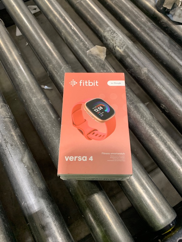 Photo 1 of Fitbit Versa 4 Fitness Smartwatch with Daily Readiness, GPS, 24/7 Heart Rate, 40+ Exercise Modes, Sleep Tracking and more, Pink Sand/Copper Rose, One Size (S & L Bands Included)