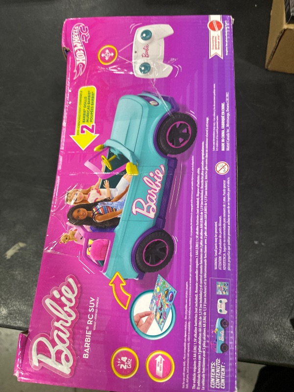 Photo 1 of Barbie Hot Wheels RC SUV, Remote-Control Pink Vehicle That Fits 2 Fashion Dolls & Accessories, Includes Kid-Applied Stickers for Customization