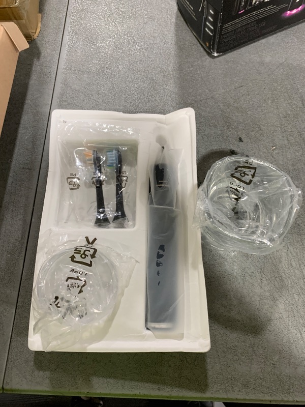 Photo 1 of Philips Sonicare DiamondClean Smart 9300 Electric Toothbrush, Sonic Toothbrush with App, Pressure Sensor, Brush Head Detection, 4 Brushing Modes and 3 Intensity Levels, Black, Model HX9903/15