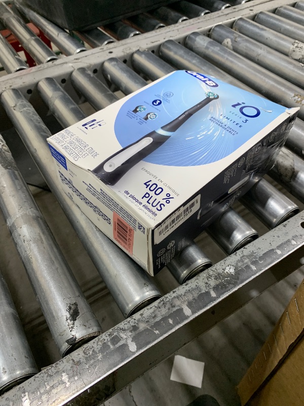 Photo 1 of Oral-B iO Deep Clean Rechargeable Electric Powered Toothbrush, Black with iO Series 3 Limited, 2 Brush Heads and Travel Case - Pressure Sensor to Protect Gums - 3 Cleaning Settings - 2 Minute Timer