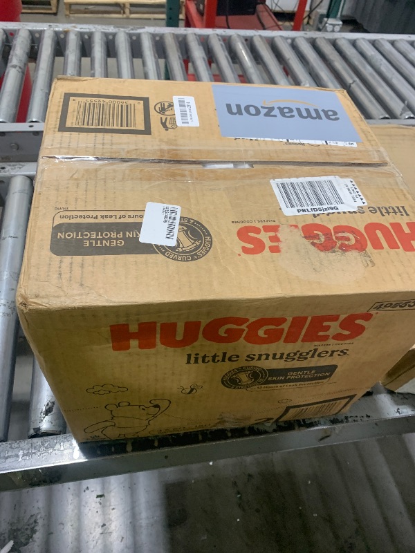 Photo 1 of Huggies Size 2 Diapers, Little Snugglers Baby Diapers, Size 2 (12-18 lbs), 180 Ct (3 packs of 60), Packaging May Vary