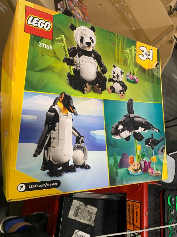 Photo 1 of LEGO Creator 3 in 1 Wild Animals Panda Family - Building Toy Kit for Kids with 3 Building Options, Panda, Penguin, or Orca - 7 Year Old Girl & Boy Birthday Gifts - 31165