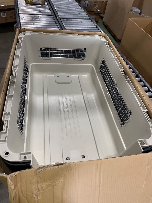 Photo 1 of SportPet Designs Plastic Kennels Rolling Plastic Wire Door Travel Dog Crate, XXL