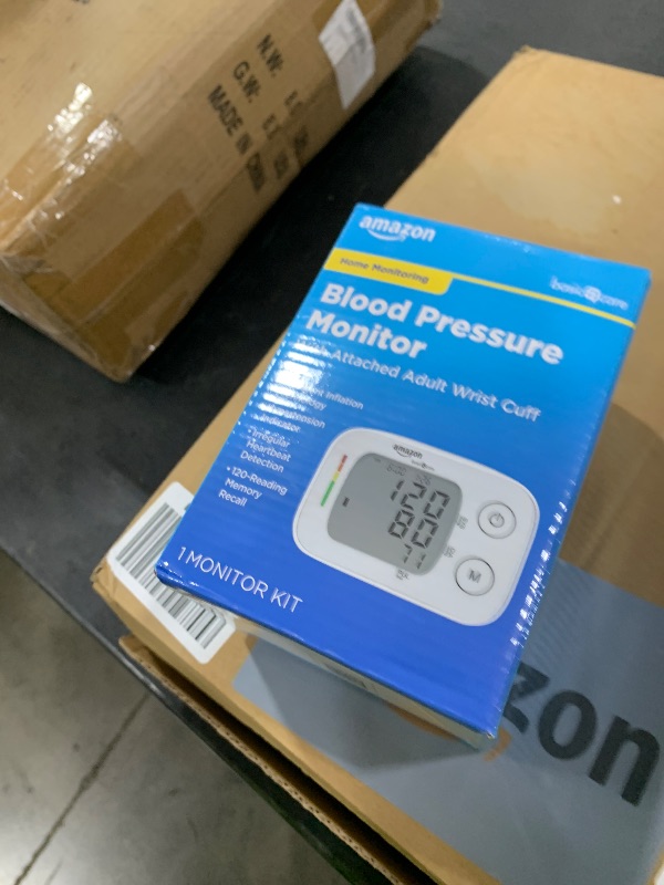 Photo 1 of Amazon Basic Care Wrist Blood Pressure Monitor - Digital BP Monitor with Large Display and Intelligent Inflation Technology