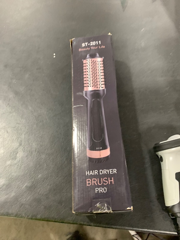 Photo 1 of Dual Voltage Hair Dryer Brush,Travel Blow Dryer Brush for Blowout Look with Universal Power Adapter, One-Step Hot Air Brush Volumizer,Smoothing,Dryer,125V/220V