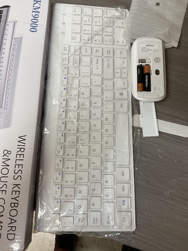 Photo 1 of Wireless Keyboard and Mouse Ultra Slim Combo, TopMate 2.4G Silent Compact USB 2400DPI Mouse and Scissor Switch Keyboard Set with Cover, 2 AA and 2 AAA Batteries, for PC/Laptop/Windows/Mac- White