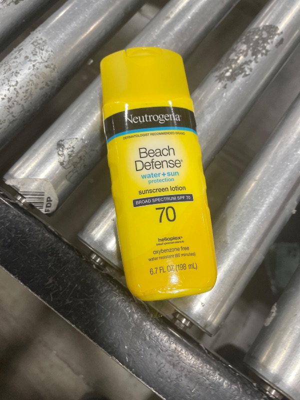 Photo 1 of Neutrogena Sunscreen Lotion Beach Defense SPF 70, Face and Body Sunscreen, Hawaii Reef Act 104 Compliant, Octinoxate & Oxybenzone Free, Oil Free, Fast Absorbing Sun Care, 6.7 fl oz